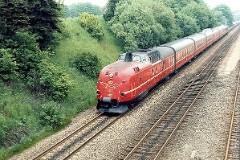 DSB MA 467 heading for Vejle. Photographed in Fredericia May 1975.   The MA trainset was built by Machinenfabrik Augsburg-Nürnberg (MAN) in Germany. The coaches were built by Linke-Hoffmann-Busch, Germany - the restaurant coaches by Wegmann & Co. Germany. Totally the trainsets were delivered in a number of 11 - the first ones put into service in 1963. The trainsets were based on the German type 11.5, but the Danish version had to be changed a lot to fit the size of the ferries taking the trains across Storebælt. The MA class was used for the socalled "Lyntog". Diesel 12 cyl. 1.100 hp. Max speed 160 km/h - 100 mph. Weight 51 metric tonnes. The MA class was in 1983/1984 painted in a silver grey colour. The trainsets were withdrawn from service in 1990. The MA 467 was in 1992 - among others - given to the Lubuska Kolej Regionalna (LKR) in Poland.. It was scrapped in 1995.